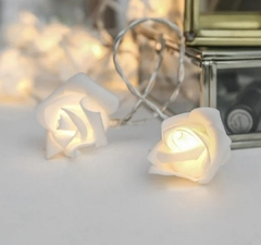 Luces de goma Eva flor x10 en calido