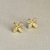 BRINCO FLOR CRAVEJADO DE MICROZIRCONIA CRISTAL
