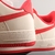 Imagem do Tênis Nike Air Force 1' 07 Low Branco com Vermelho