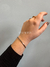 BRACELETE TORCIDO SLIM PRATA OU DOURADO na internet