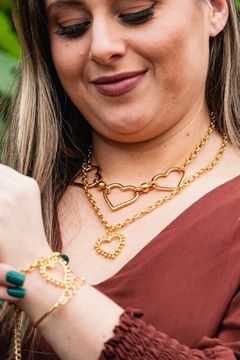 Pulseira coração bolinhas na internet