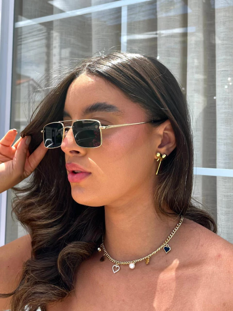 Brinco coração derretido dourado - Aço Inox - comprar online