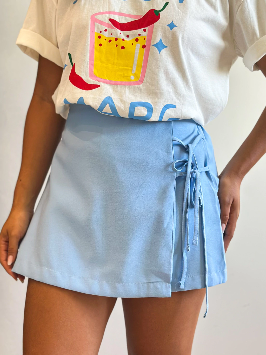 Short saia lateral