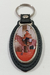 Llavero simil cuero oval con imagen del Cura Brochero