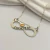 Conjunto cadena de plata y dije infinito de plata con oro 18 TF1 en internet