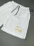 BERMUDA NIKE GOLD SWOOSH na internet
