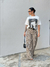 CALÇA WIDE LEG ONÇA na internet