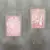 Kit de dois quadros com a Ave Maria e a imagem de Nossa Senhora de Lourdes, em fundo rosa com flores.