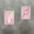 Kit de quadros religiosos com imagens da pomba e Nossa Senhora de Fátima em fundo rosa.