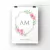 Quadro decorativo com monograma "AM" e flores de peônia em tons de rosa.
