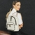 MOCHILA FEMININA GRANDE COM COSTURAS NO BOLSO FRONTAL na internet