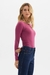 BODY FEMININO FLOR DE LIS MANGA LONGA COM DETALHE NA LATERAL - comprar online
