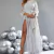 VESTIDO FEMININO COM MANGA RENDA PRATA HOT PANT COM FENDA na internet