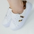 TÊNIS FEMININO EM COURO BRANCO COM DETALHE EM V INSPIRAÇÃO - comprar online