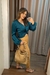 CALÇA FEMININA FLOR DE LIS JUSTA COM BOLSO na internet