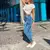 Calça jeans de cintura alta feminina na internet