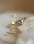 Anel Wave em Ouro 18k com Água-Marinha e Diamantes na internet