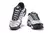 Tenis Nike Air Max TN Plus "Oreo" em preto e branco, com detalhes em malha e sola robusta.