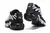 Imagem dos tênis Nike Air Max TN Plus "Oreo" com detalhes em preto e branco.