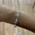 Pulseira Coração Tortinho com Pontos de Luz na internet