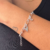 Pulseira Coração Tortinho com Pontos de Luz - comprar online