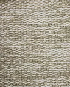 Detalhe da textura do tapete chenille de algodão e sisal em tons bege e cru