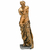 Escultura dourada da Venus de Milo, representando a deusa da beleza em uma pose clássica.