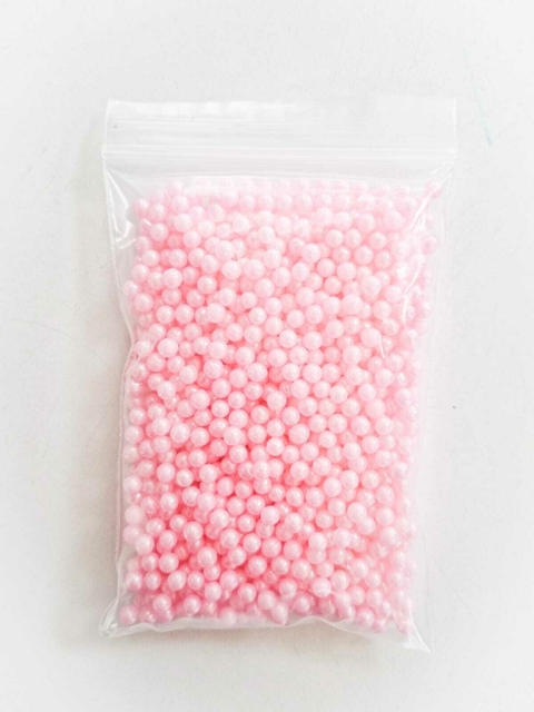 Paquete de gotas perlas medianas color rosa de 50g.