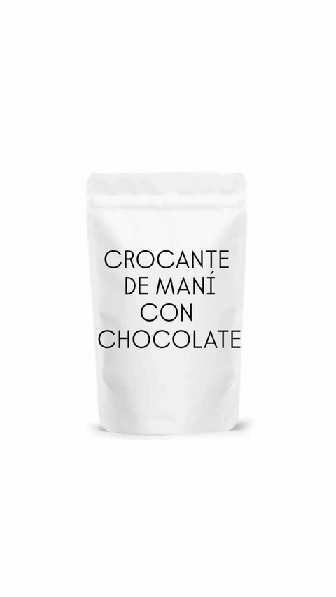 Paquete blanco de 100 gramos con etiqueta que dice Crocante de Maní con Chocolate