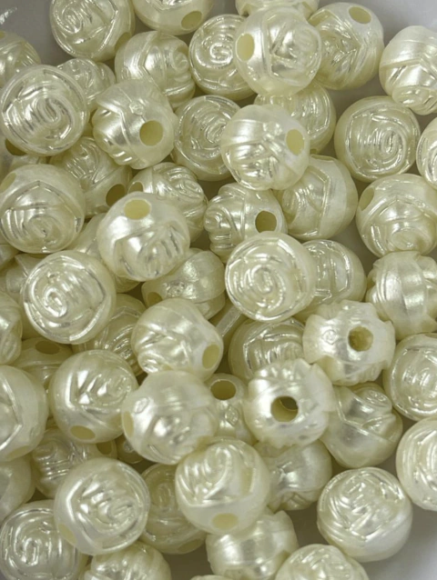 Pasante perla rosa. Plástico n 10