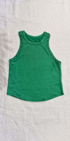 MUSCU CON TACHAS