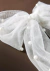 Image of Prendedor de cabelo laço de tule pérolas