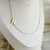 Colar com letra inicial na lateral em banho de Ouro 18K - loja online