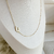 Colar com letra inicial na lateral em banho de Ouro 18K - loja online