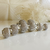 Trio de Brincos Argola Click Redonda Bold com Zircônias Cravejadas em Banho Ródio Branco