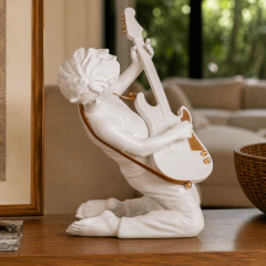 Escultura O Guitarrista en internet
