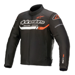 Campera impermeable Alpinestars T-SP-S Ignition en color negro, con detalles en blanco y naranja, ideal para motociclismo.