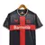 camisa-bayer-leverkusen-i-24-25-torcedor-castore-masculina-preta-com-detalhes-vermelho-