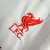 kit-infantil-liverpool-iii-24-25-nike-branco-com-detalhes-vermelho