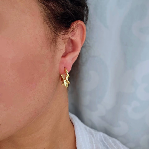 Brinco argola tubo torcido - comprar online