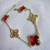 Pulseira trevo inspiração multi vermelho rubi