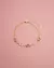 Pulseira com Zircônios Rosas e Brancos - Banho Ouro na internet