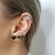 Piercing de pressão fake Cravejado com strass folheado Ródio