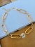 Colares Choker banhado a Ouro Maxi elos cadeado na internet