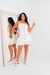 VESTIDO EM COURO FAKE COM LAPELA E ZIPER FRONTAL - comprar online