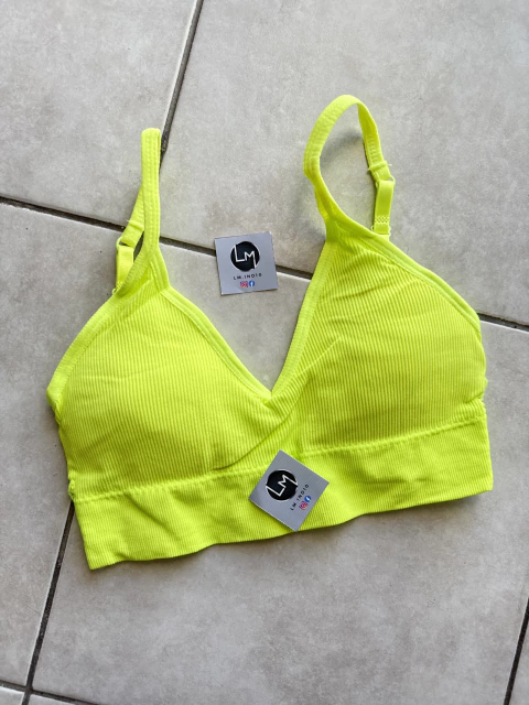 Top deportivo amarillo con relleno
