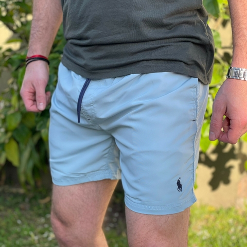SHORT POLO LISO CELESTE