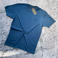 REMERA POLO CLASICA PETROLEO en internet