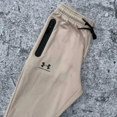 PANTALON JOGGING RIVAL FLEECE UA BEIGE en internet