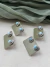Brinco Pequeno Redondo Larimar - comprar online